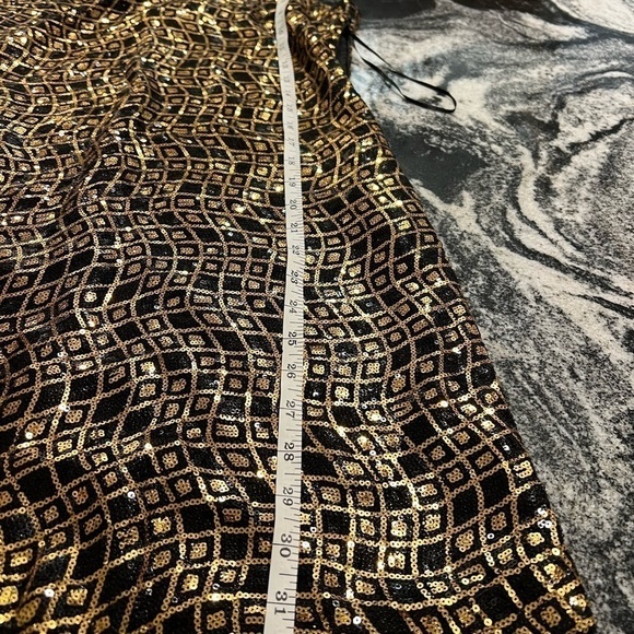 Romeo and Juliet Couture Sleeveless Sequined Black and Gold, Party Dress. - Picture 7 of 14
